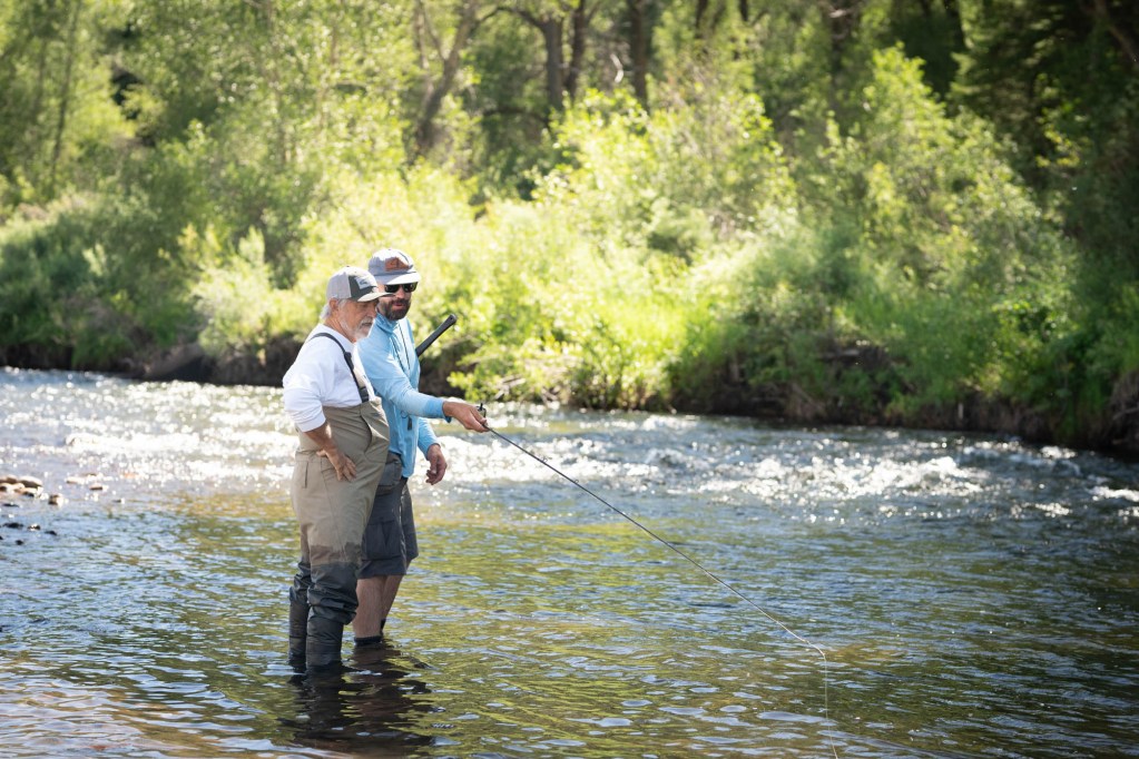 two men guided fly fishing east river Crested Butte Colorado