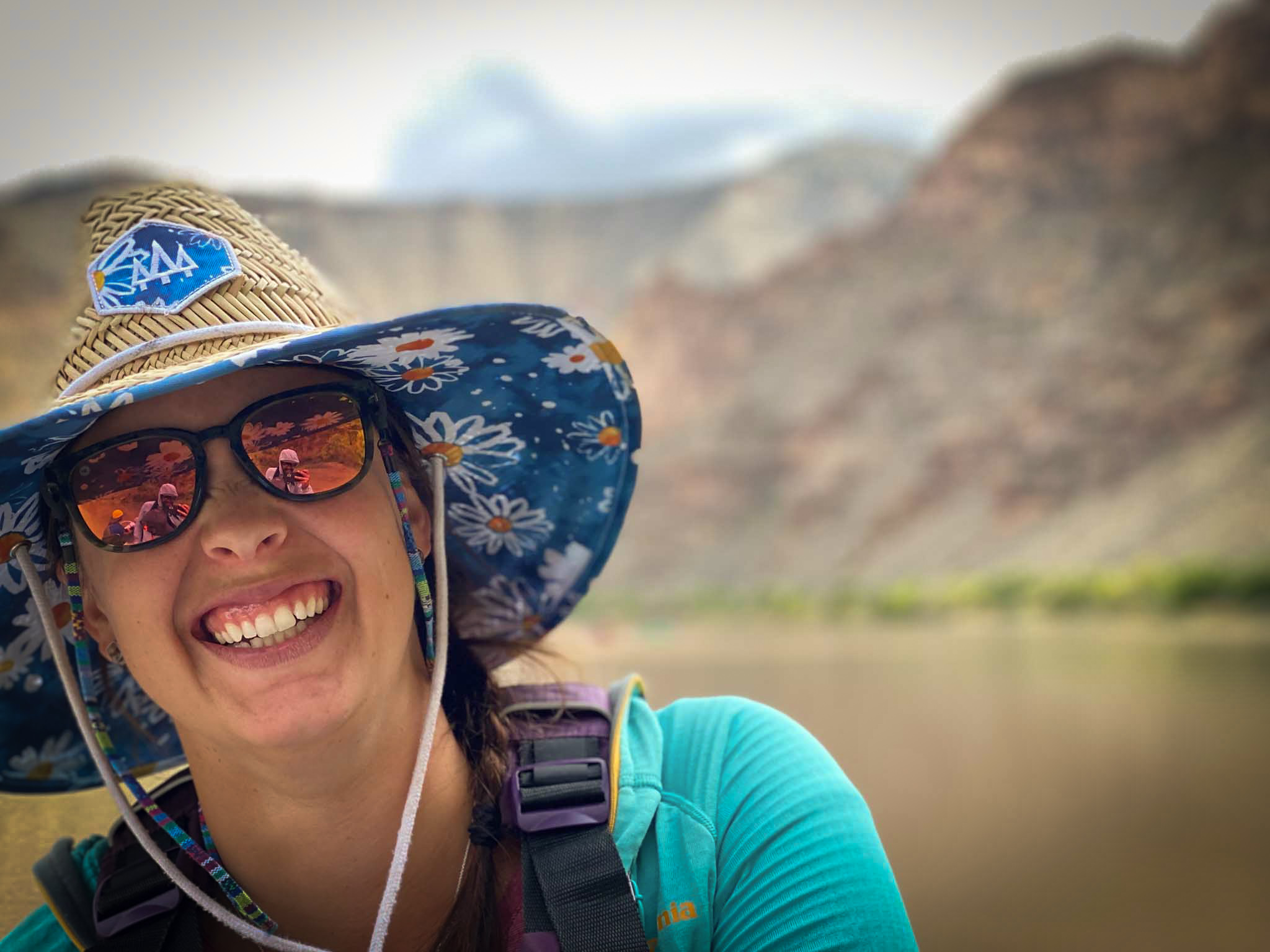 Woman in helock hat while rafting