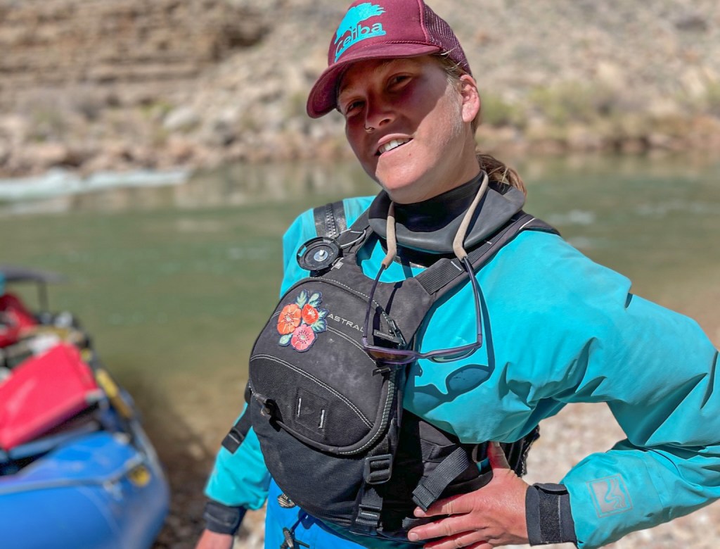 Woman in astral PFD and blue dry suit grand canyon