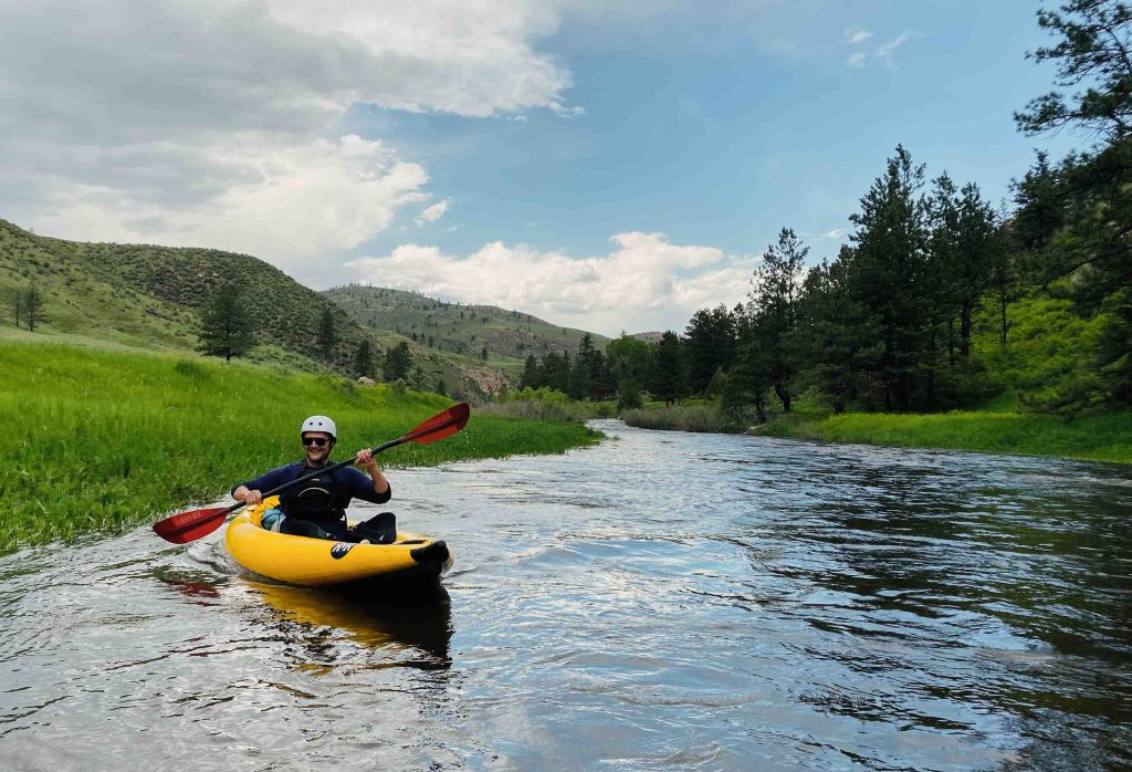Inflatable kayak ducky raft paddling north fork poudre river