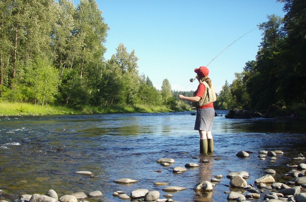 woman fly fishing