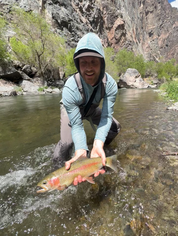 Rob Hammer holding Rainbow trout black canyon gunnison national park