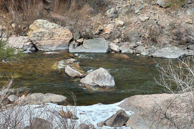 Poudre River with boulders and snow